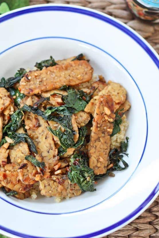 A flavorful one skillet meal with tempeh, sautéed kale and coconut aminos. A one skillet meal with tempeh, sautéed kale and coconut aminos.
