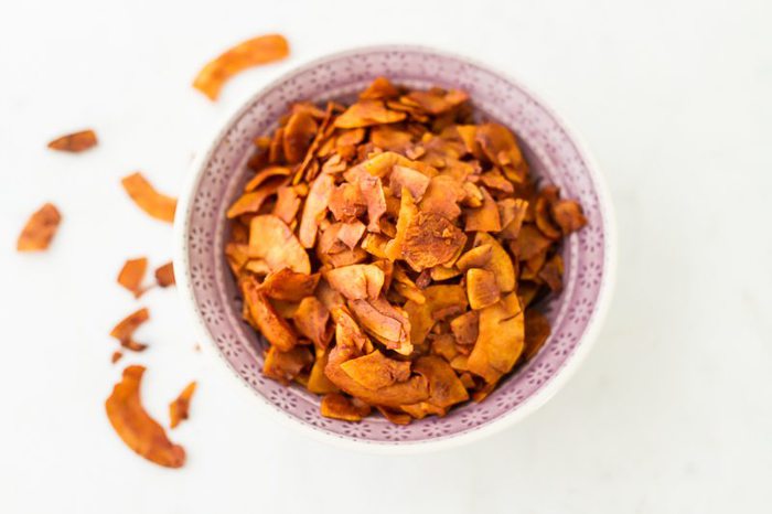 Vegan Coconut Bacon in a light purple bowl.