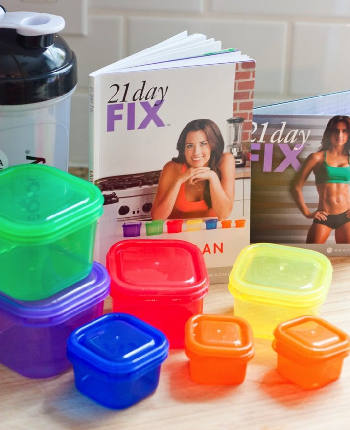 21 Day Fix 21 Day Fix book and plastic food storage containers.