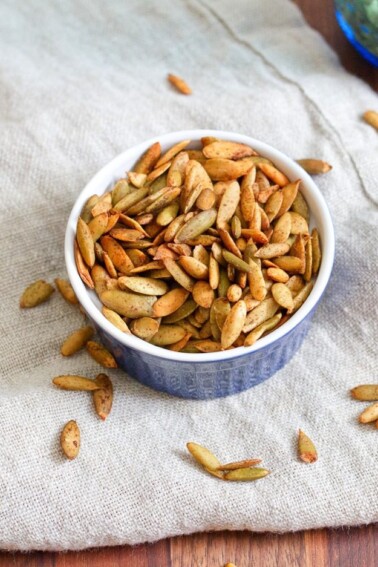 Pumpkin spice roasted pepitas in a small bowl.