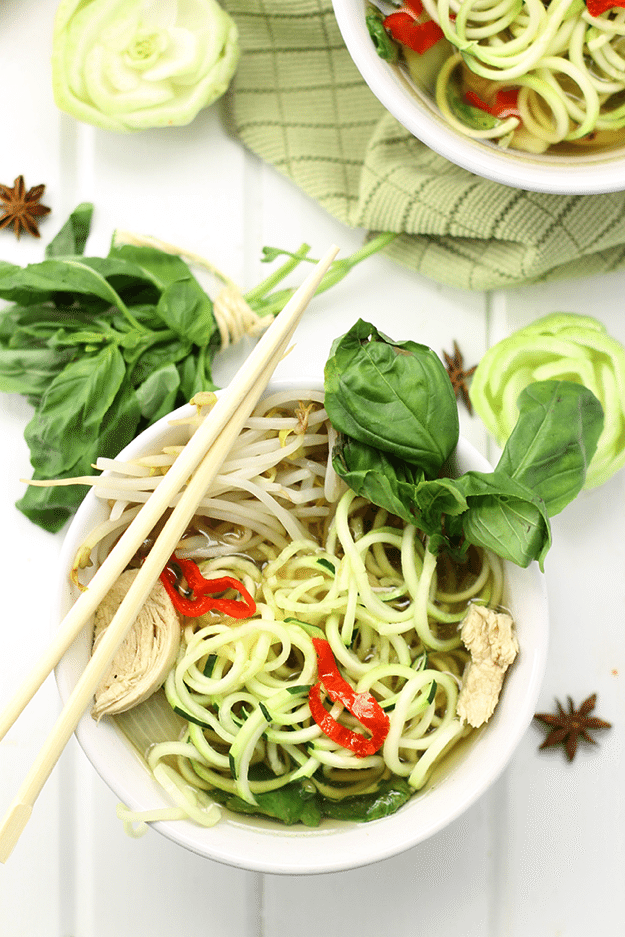 Healthy Chicken Pho with Zucchini Noodles by The Healthy Maven White bowl with Healthy Chicken Pho with Zucchini Noodles
