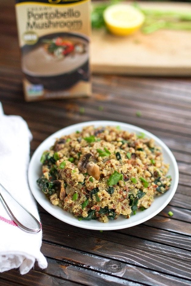 Mushroom Kale Quinoa Risotto Mushroom Kale Quinoa Risotto on a white plate topped with fresh herbs.