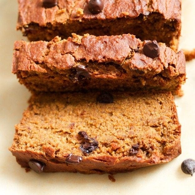 Spiced with cinnamon, nutmeg, ginger and allspice this moist and tender chocolate chip pumpkin bread is everything a pumpkin quick bread should be but a tad healthier, gluten-free and vegan. Sliced loaf of pumpkin quinoa bread.