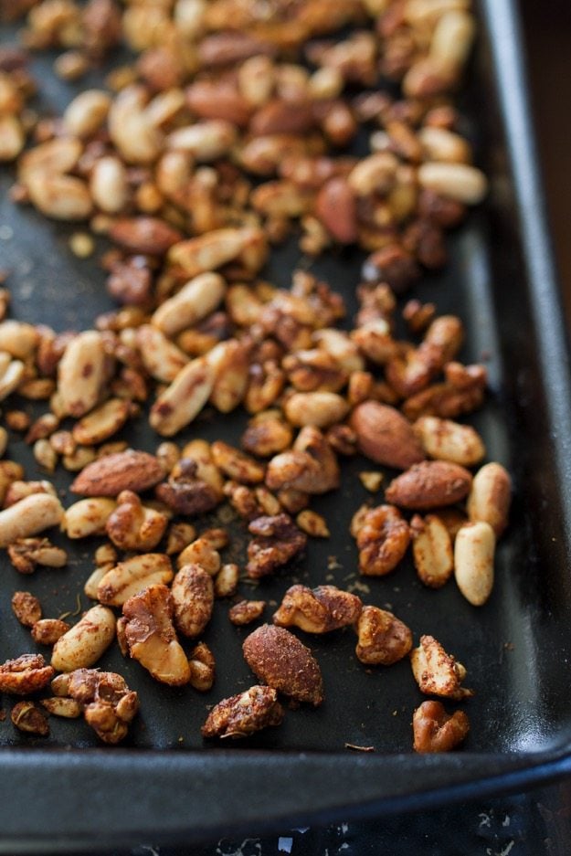 PIN THIS --> Cajun Trail Mix Cajun trail mix spread out with a crunchy blend of nuts, seeds and raisins coated with cajun-inspired seasonings.