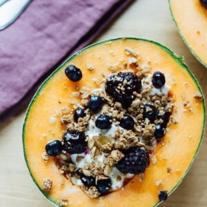 Cantaloupe Breakfast Bowls with Greek Yogurt, Berries, Granola and Honey