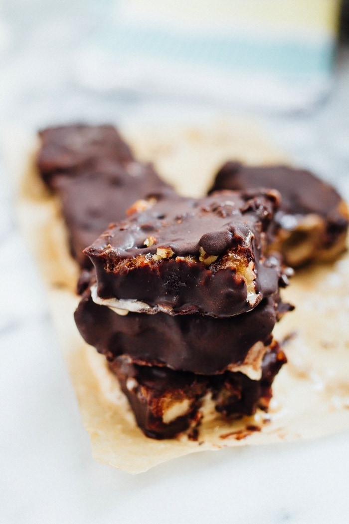 Pin this image to save this healthy frozen treat! Close up of chocolate caramel banana ice cream bar.