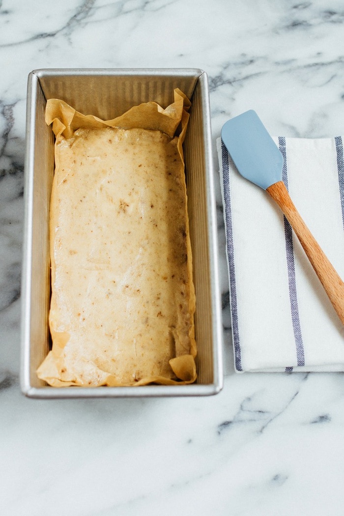 Pin this image to save a healthy banana ice cream bar recipe! Chocolate Caramel Banana Ice Cream in a baking dish.