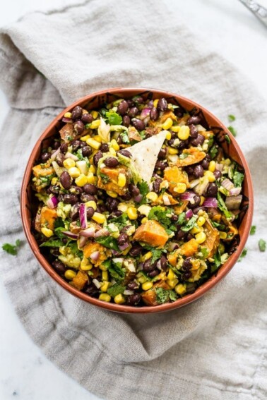 Sweet potato black bean dip served with tortilla chips in a bowl.