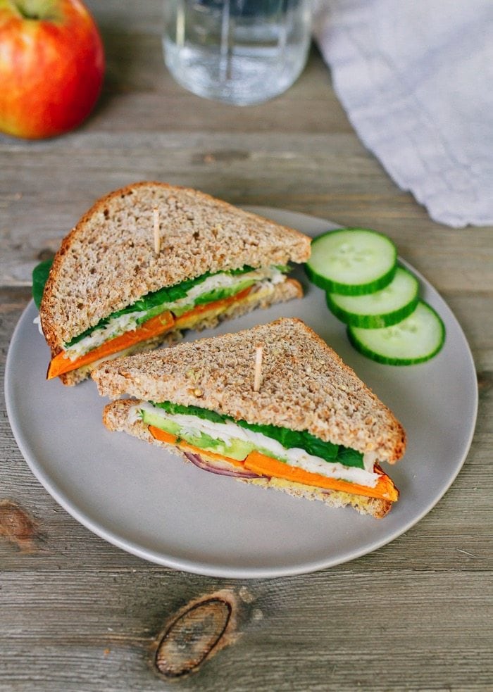 Healthy Sweet Autumn Turkey Sandwich packed with crispy apple slices, roasted sweet potato, red onion, avocado and a honey mustard hummus spread. Healthy Sweet Autumn Turkey Sandwich packed with crispy apple slices, roasted sweet potato, red onion, avocado and a honey mustard hummus spread.