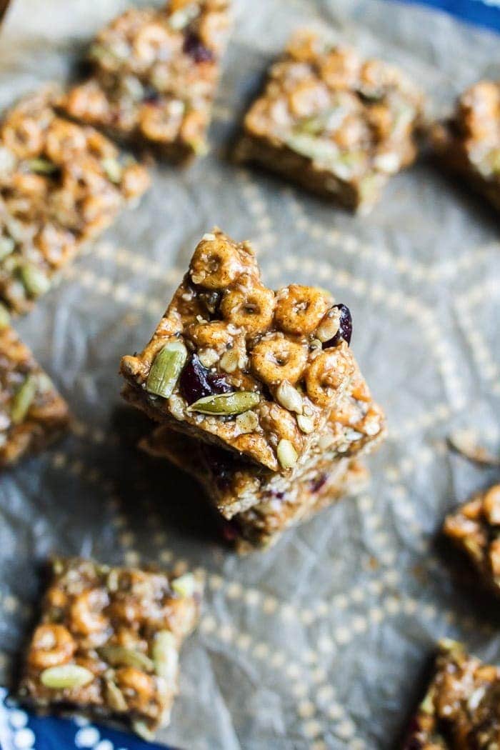 These DELICIOUS Pumpkin Spice Cereal Squares are a fall spin on my original recipe for superfood cereal squares. They’re loaded with good for you ingredients and full of pumpkin spice flavor. Gluten and dairy-free! Stacked pumpkin spice cereal squares.