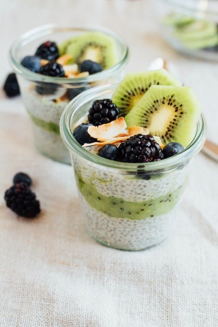This Kiwi Chia Pudding Parfait is a unique way to enjoy fresh kiwi. The combo of chia seed pudding and kiwi puree makes for a healthy breakfast or snack that’s filling and delicious. Kiwi chia pudding topped with kiwi slices, fresh blackberries and toasted coconut.