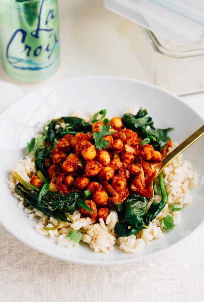 These vegan curried chickpea bowls make meal prepping for the week a breeze. The chickpeas are paired with garlicky spinach and brown rice for an easy meal that’s absolutely delicious and filling. These vegan curried chickpea bowls make meal prepping for the week a breeze. The chickpeas are paired with garlicky spinach and brown rice for an easy meal that’s absolutely delicious and filling.