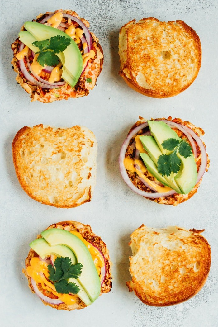 Teriyaki Salmon Burgers with Sriracha Mayo, Avocado and Red Onion Teriyaki Salmon Burgers with Sriracha Mayo, Avocado and Red Onion