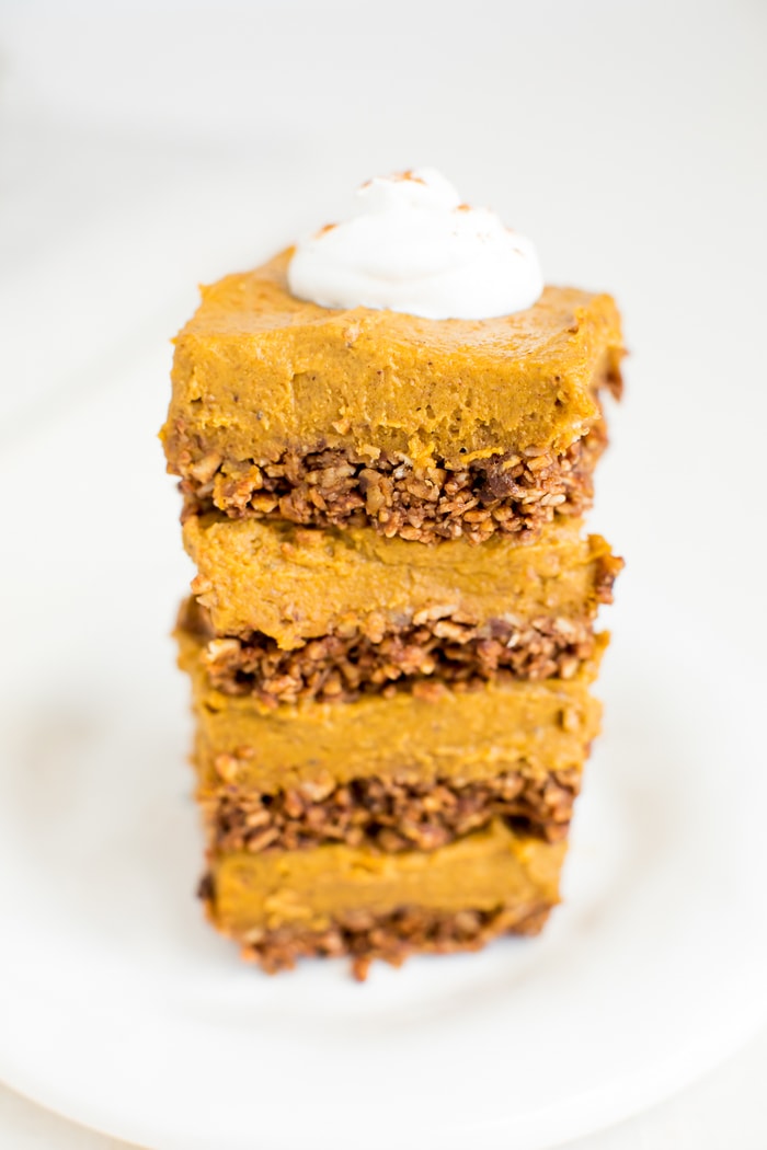 These decadent pumpkin pie bars pair a crunchy granola crust with a creamy, thick pumpkin filling with coconut oil and cashew butter. Vegan & gluten-free. These decadent pumpkin pie bars pair a crunchy granola crust with a creamy, thick pumpkin filling with coconut oil and cashew butter. Vegan & gluten-free.