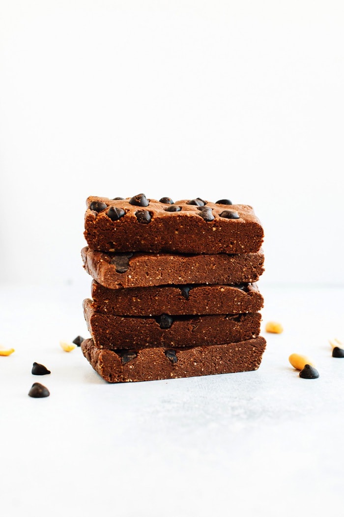 Pin this recipe for Homemade Peanut Butter Chocolate Protein Bars! Stack of Homemade Chocolate Peanut Butter Protein Bars
