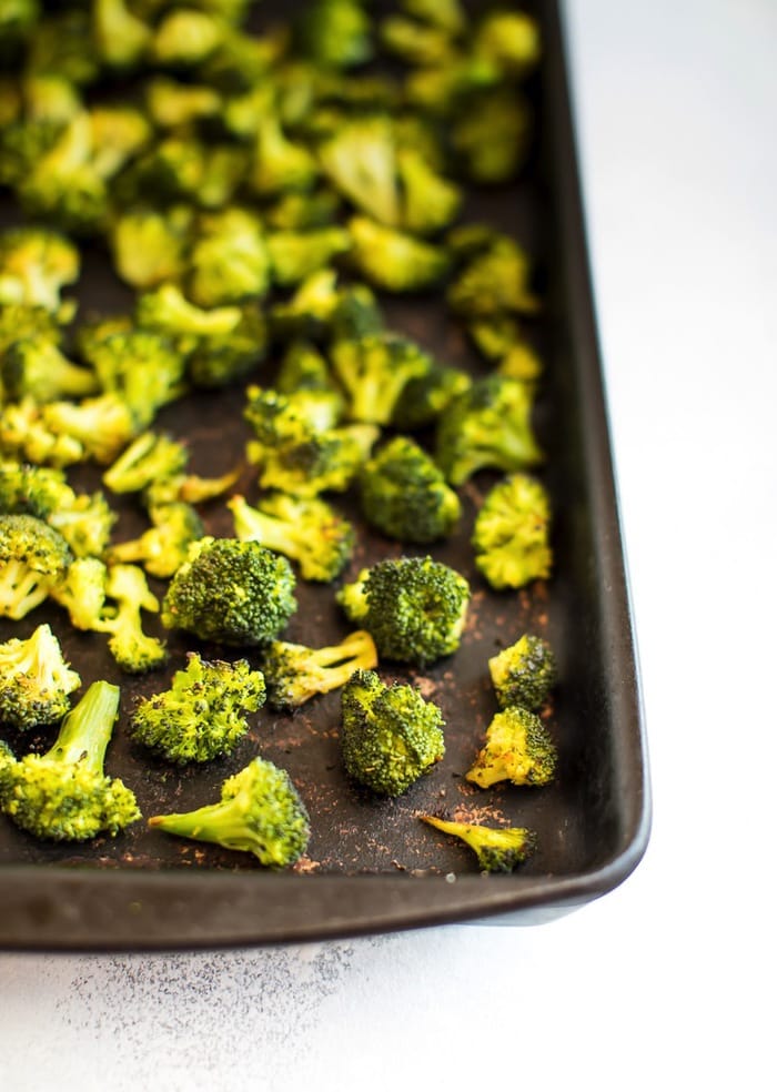 Try this roasted frozen broccoli hack and then tell a friend about it! Roasted frozen broccoli on a baking stone