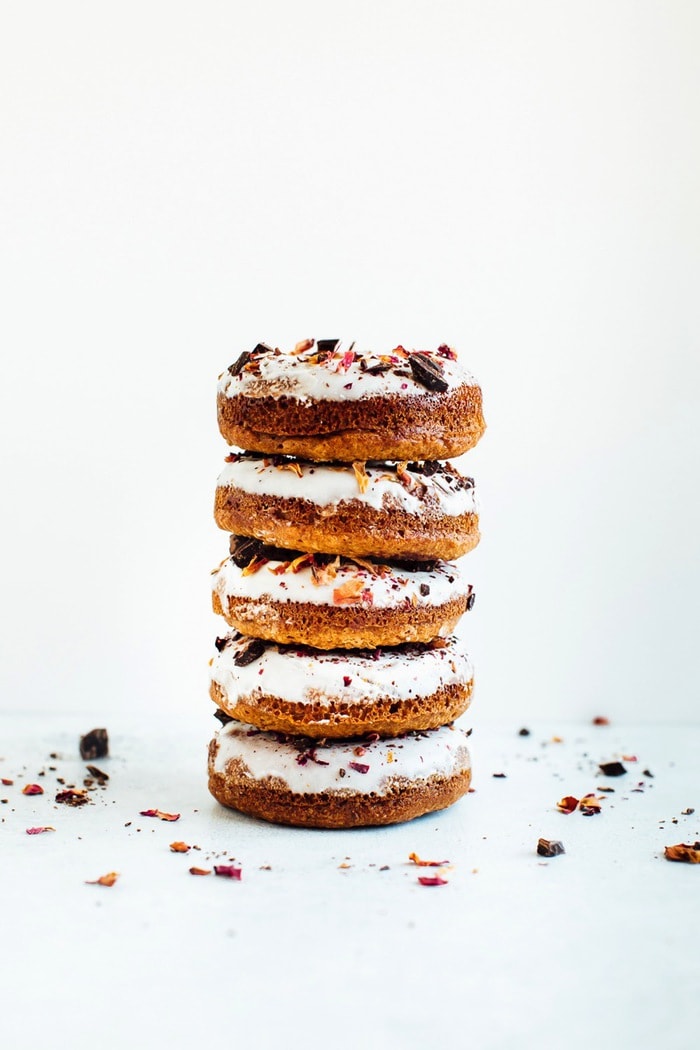 Baked almond flour donuts with rose petals and dark chocolate. Gluten-free, dairy-free and sweetened with coconut sugar. Baked almond flour donuts with rose petals and dark chocolate. Gluten-free, dairy-free and sweetened with coconut sugar.