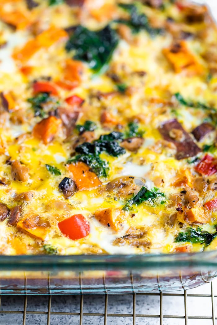 Egg, veggie, and sausage breakfast casserole in a casserole dish.