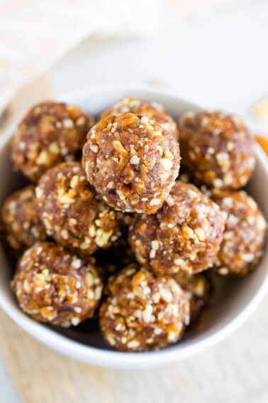 Pumpkin pie energy balls served in a white bowl.