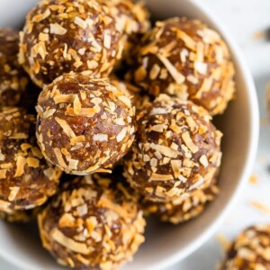 Samoa energy balls served in a white bowl.