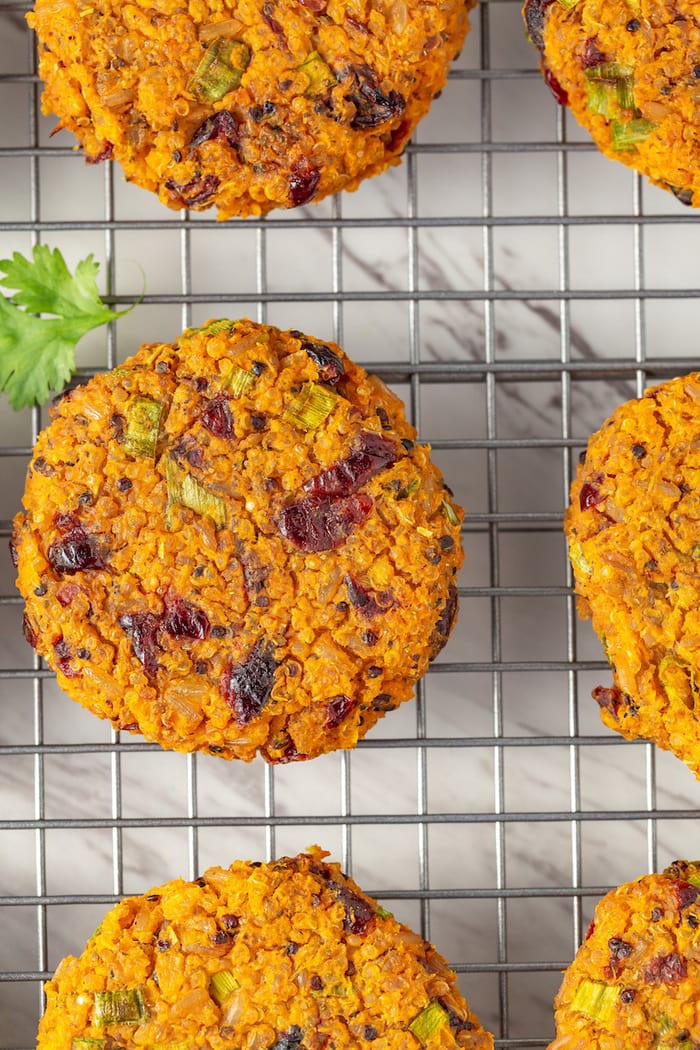 Sweet potato quinoa cakes on a wire rack, close up photo.