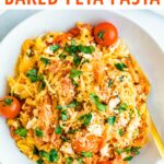 Plate of spaghetti squash with feta, basil and tomatoes.