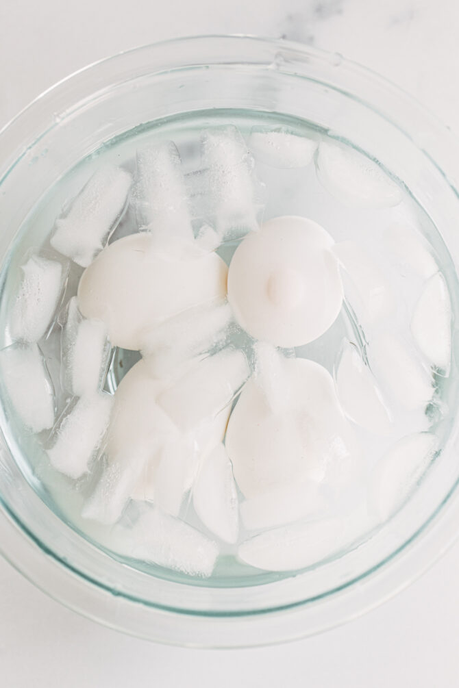 Hard boiled eggs in an ice bath.