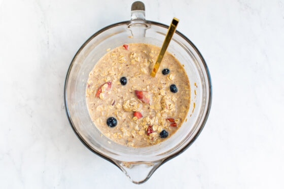Mixing bowl with mixture for berry baked oatmeal.