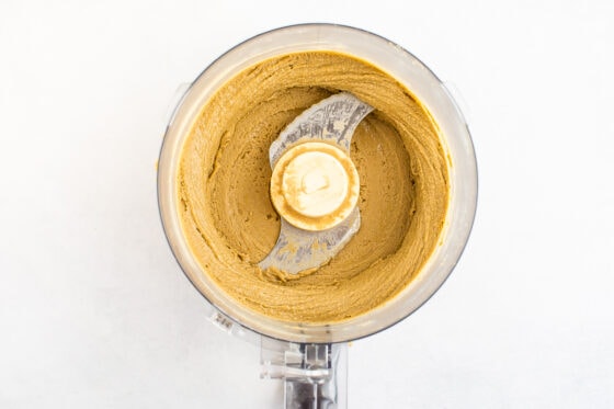 Sunflower butter after being processed in food processor.
