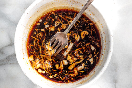 Tamari, coconut oil, vinegar, ginger and garlic mixed together in small bowl