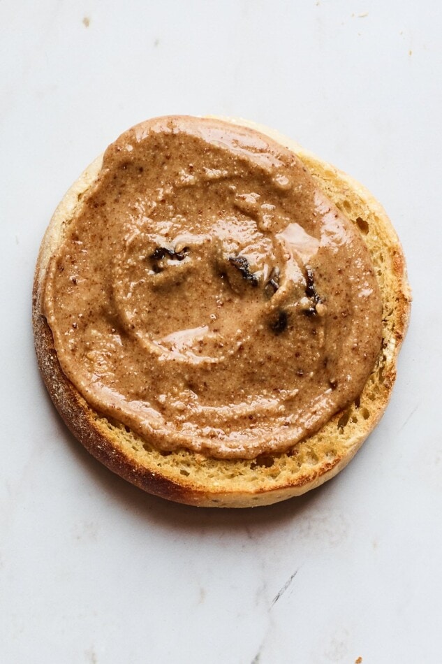 Cinnamon Raisin Almond Butter A toasted english muffin covered with cinnamon raisin almond butter.
