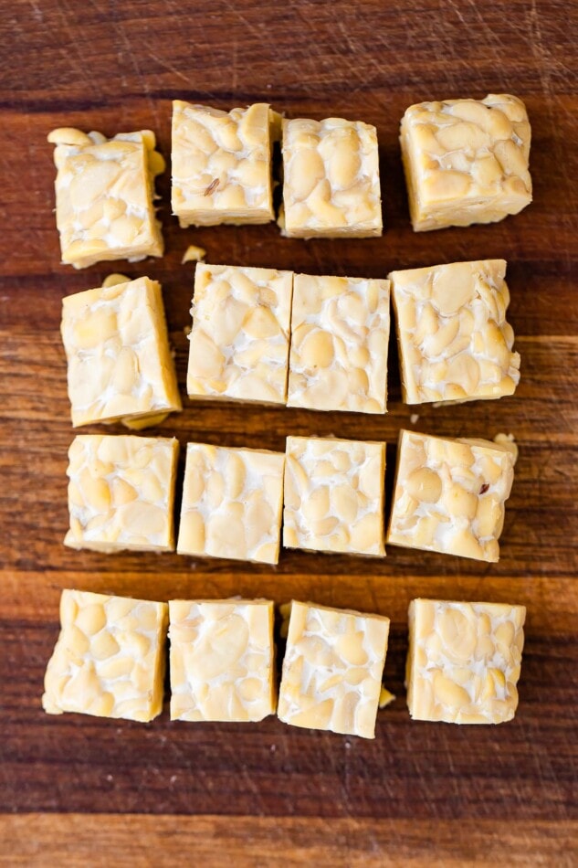 Tempeh square cut into 4x4 cubes.