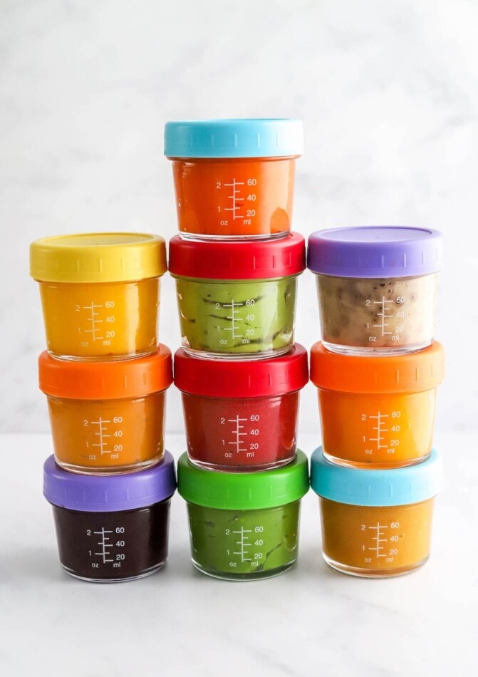 Ten baby food jars stacked on top of each other.