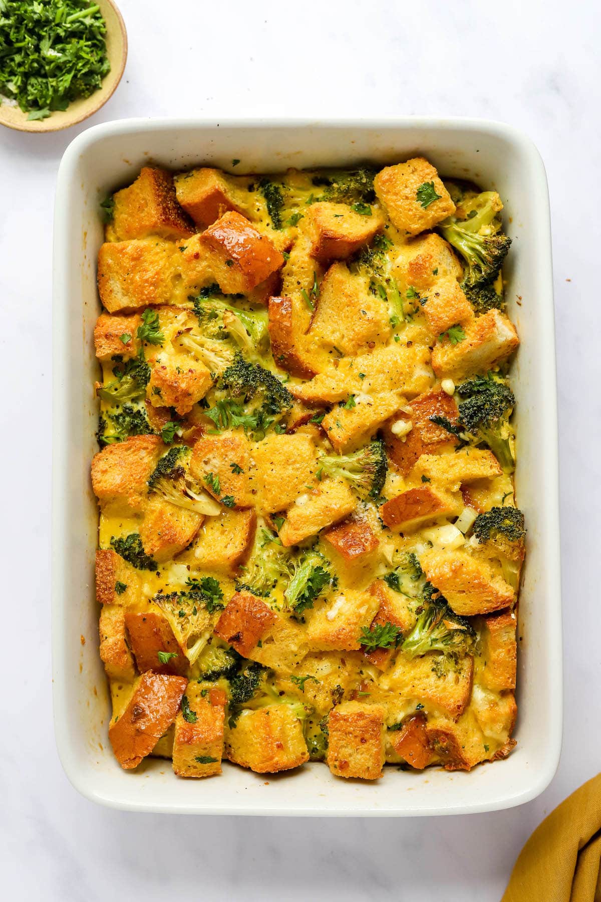 Pin this image to save this healthy breakfast casserole for later! A healthy breakfast casserole in a baking dish.