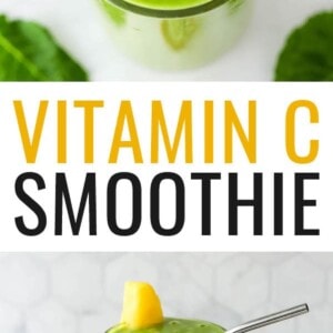A glass containing vitamin c smoothie. It's topped with a wedge of pineapple and a straw.
