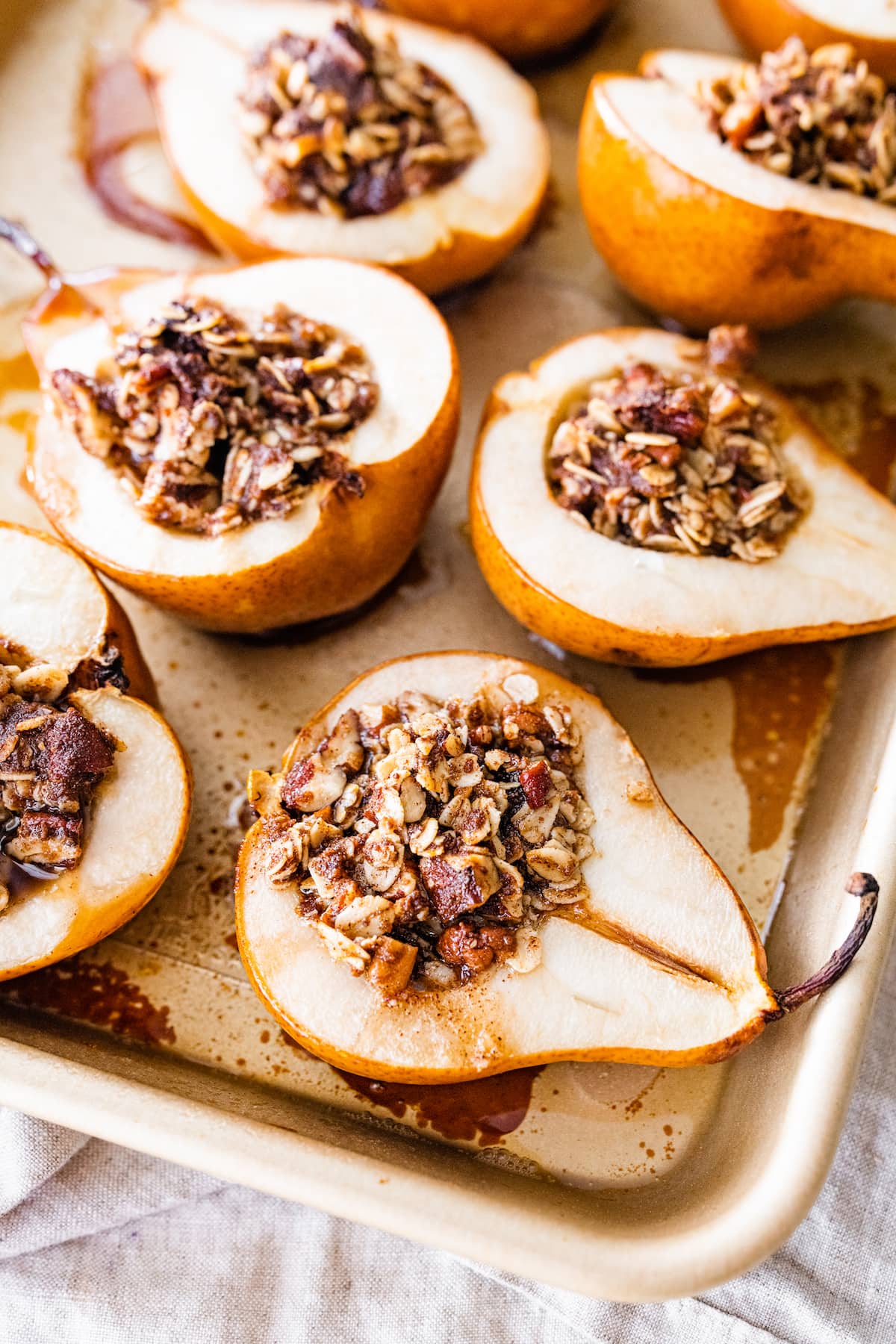 Baked pears on a sheet pan.