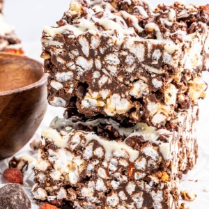 Crispy chocolate rice cake bars stacked on top of each other.