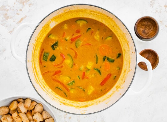 Vegetable curry cooking in a pot.
