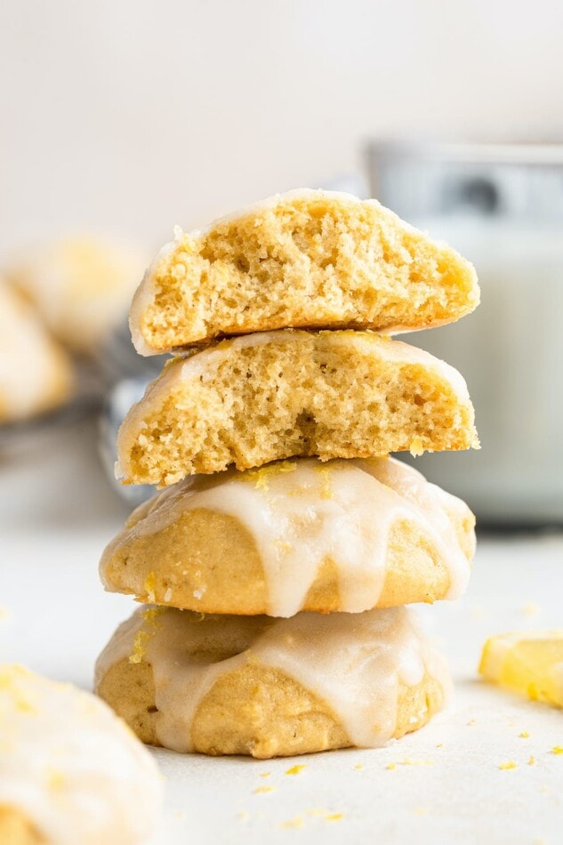 A stack of cookies. The top two cookies are cut in half.