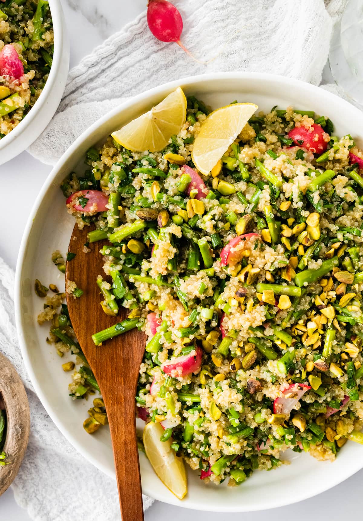 Fresh and Flavorful Spring Quinoa Salad Spring quinoa salad in a serving bowl.