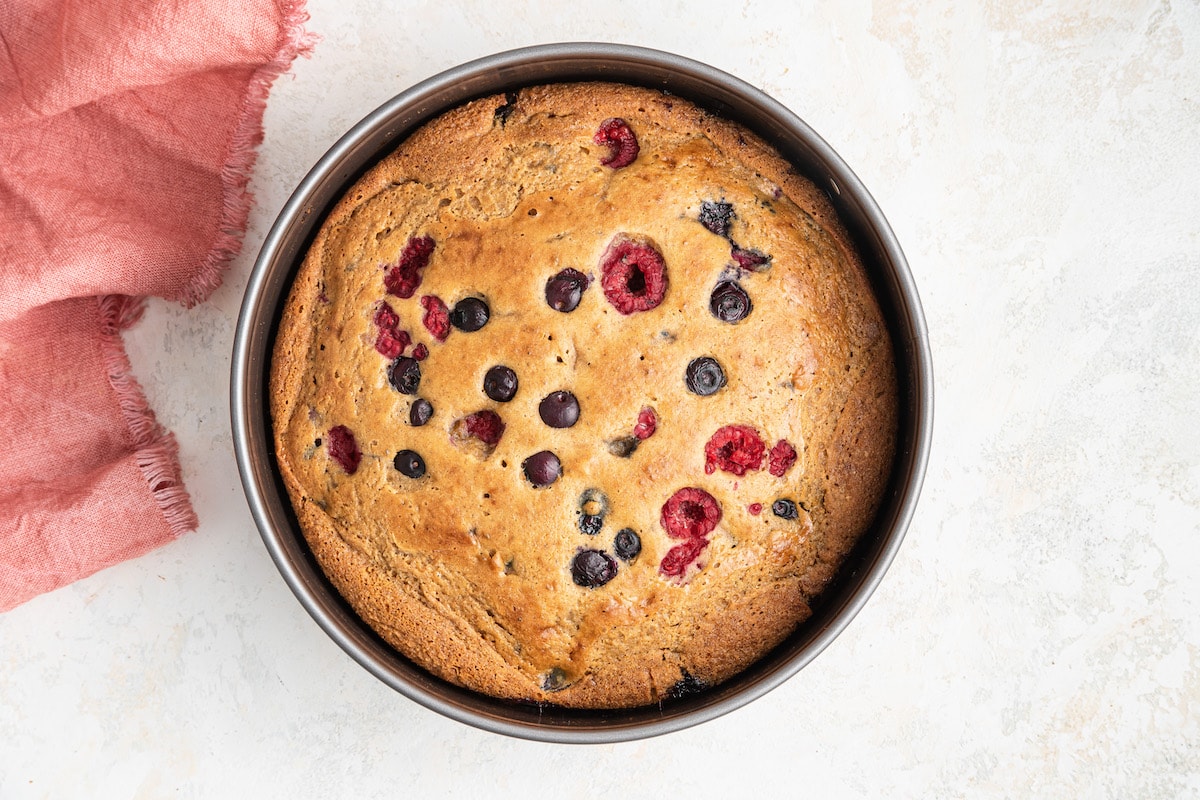 Baked berry cake in a springform pan.