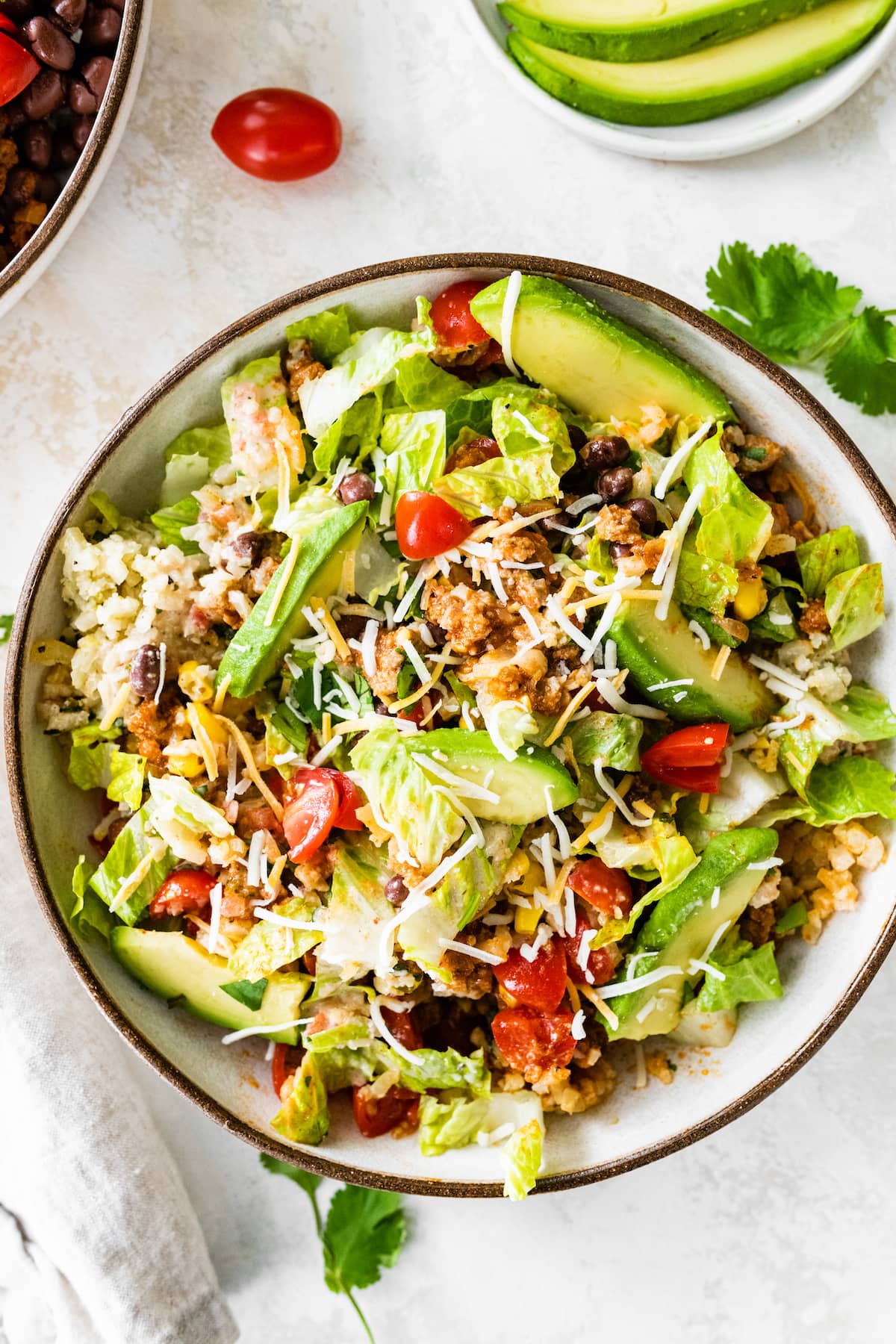 Turkey Taco bowl all mixed together in a white bowl.