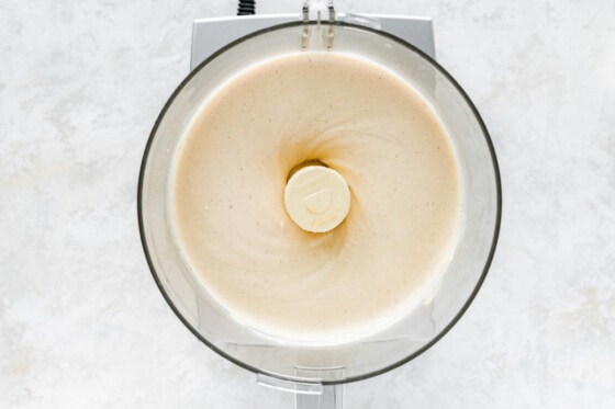 Blended cottage cheese ice cream in a food processor.