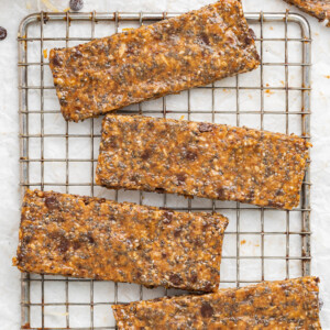 Coconut chia bars on a wire rack.