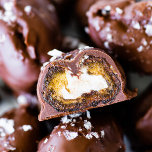 A date mounds bar showing the inside with a creamy coconut filling.