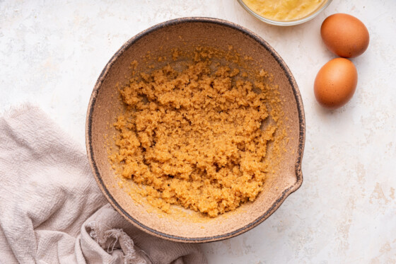 Sugar and butter combined in a large mixing bowl.