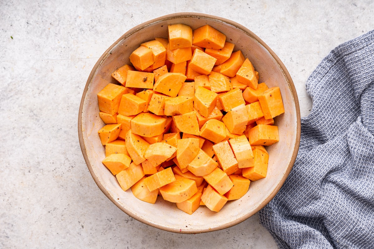 Cubed sweet potato in a large bowl.
