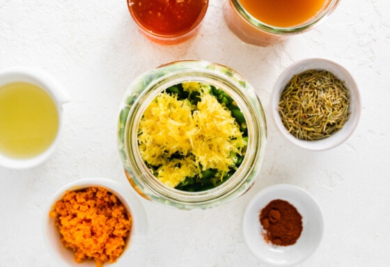Ingredients being prepped in a large mason jar that will be used to make a warm drink.
