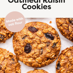 Oatmeal Raisin Cookies on parchment paper.