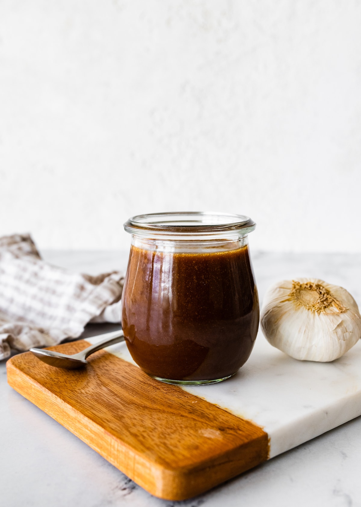 A balsamic vinaigrette in a glass jar.